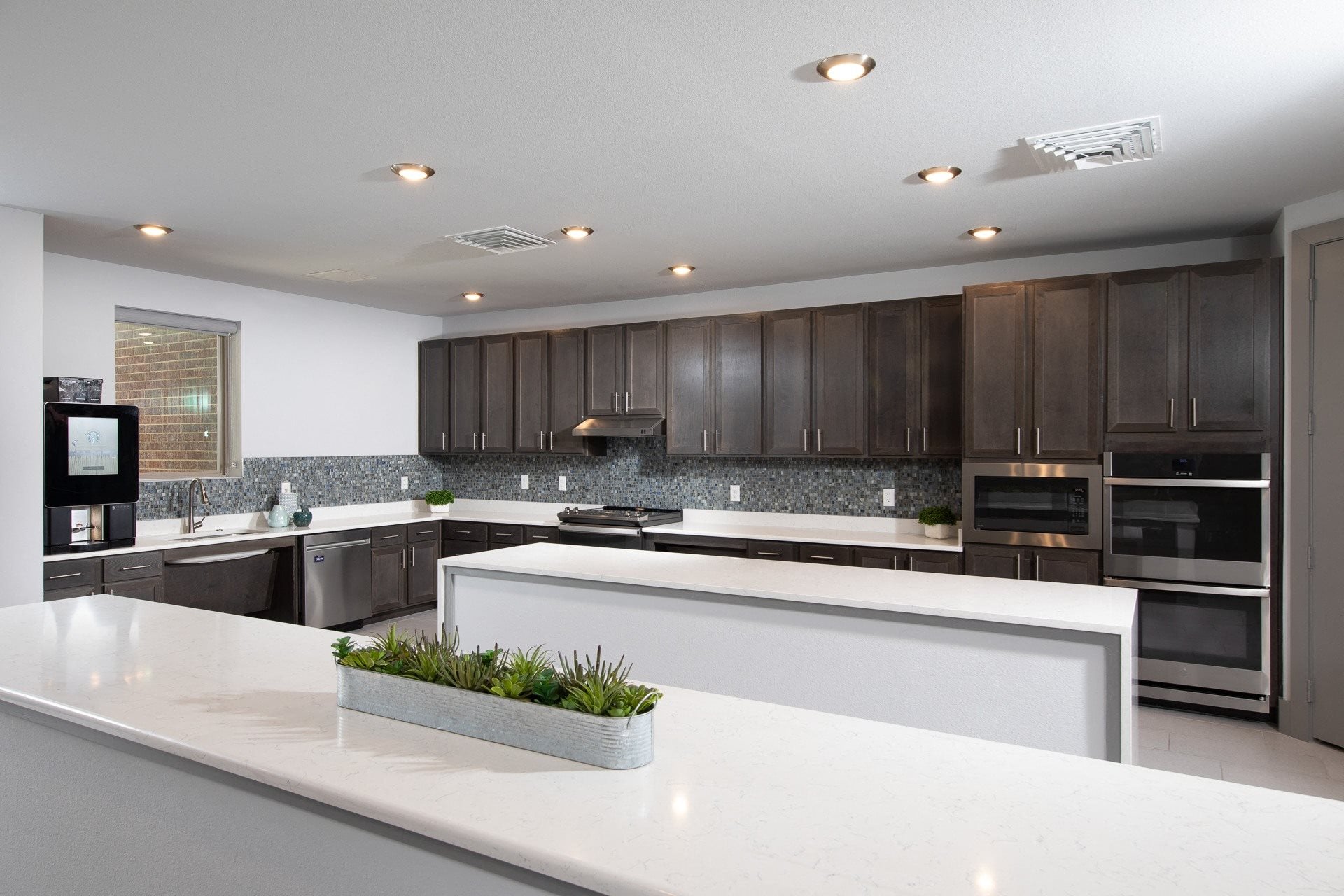 a resident community kitchen at a senior apartment community